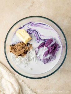 Cassava ube cake ingredients in a bowl.