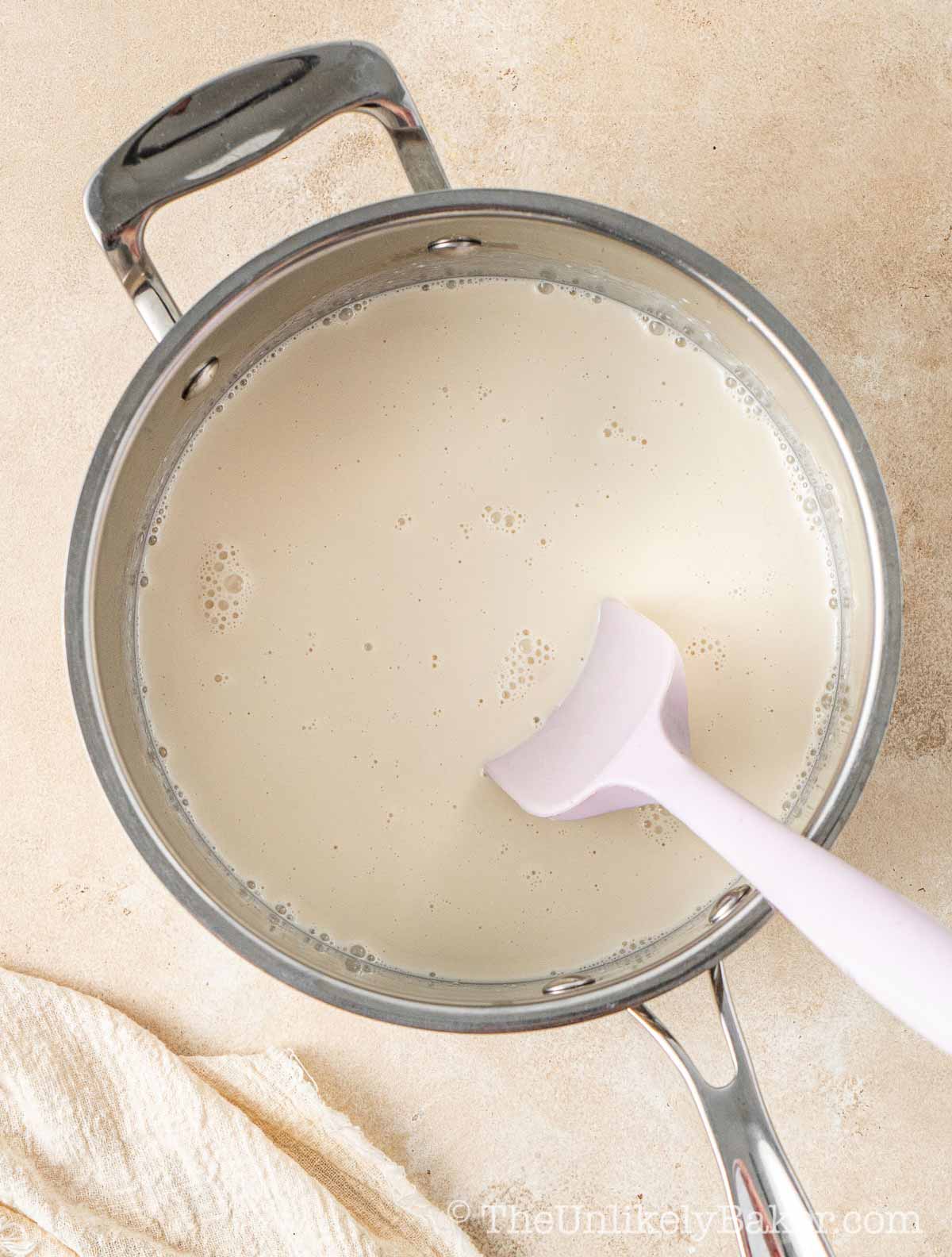 Milk mixture in a pot.