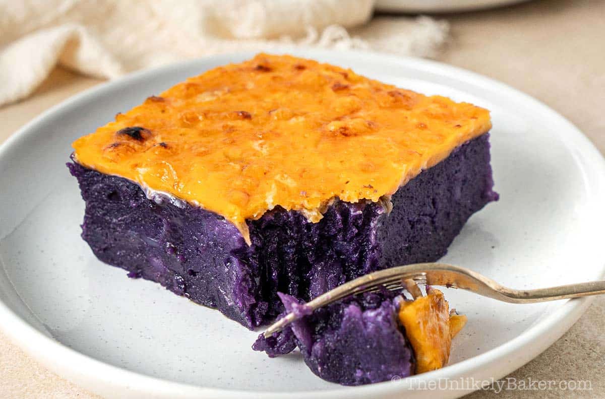 Slice of creamy cassava cake with ube.