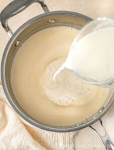 Cornstarch mixture added to milk mixture.