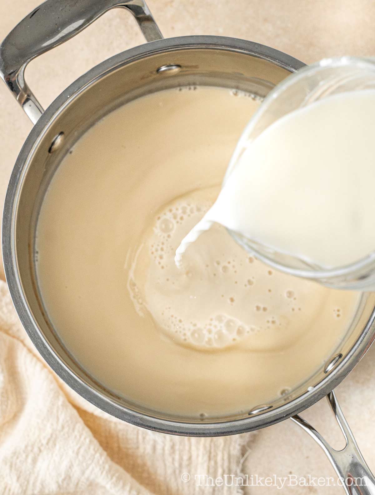 Cornstarch mixture added to milk mixture.