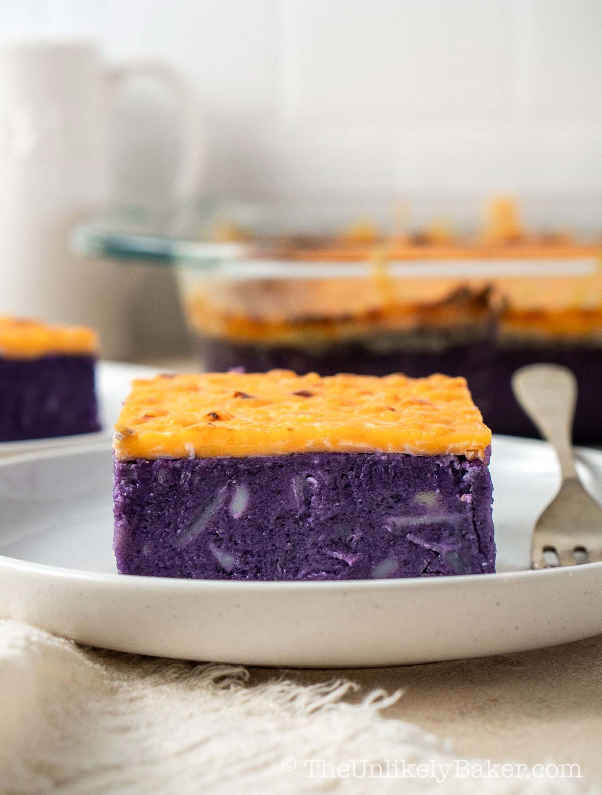 Slice of cassava ube cake with macapuno.