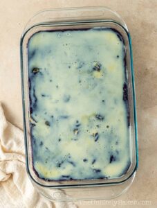 Condensed milk on top of baked cake.