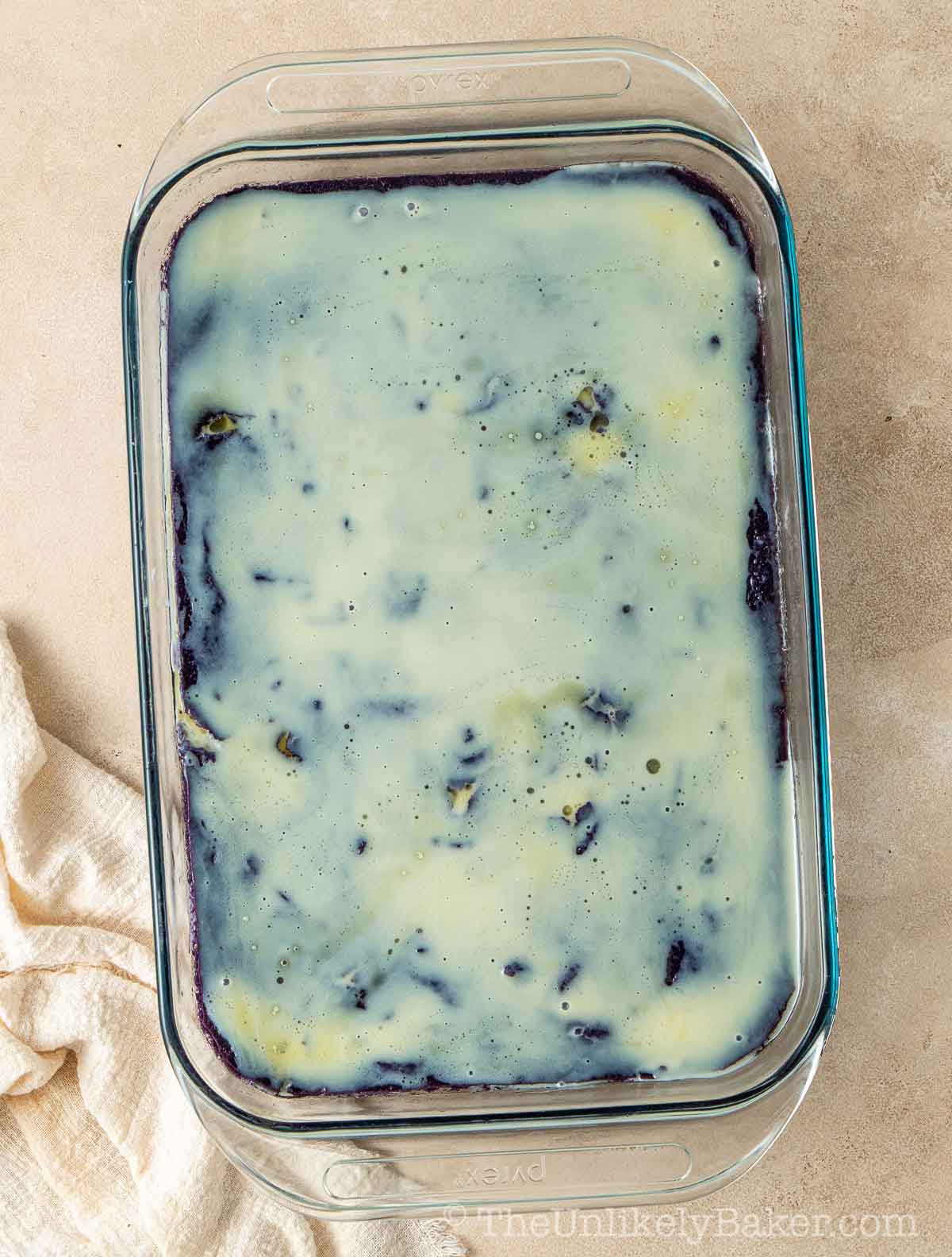 Condensed milk on top of baked cake.