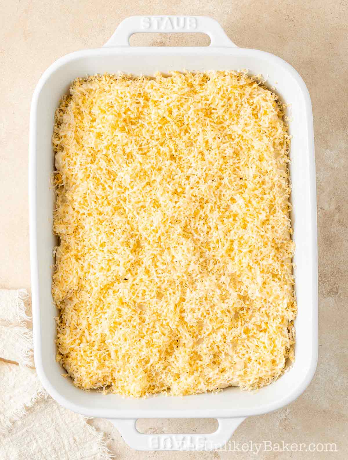 Cheese topping on maja mixture.
