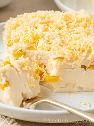 Creamy maja blanca with corn topped with cheese.