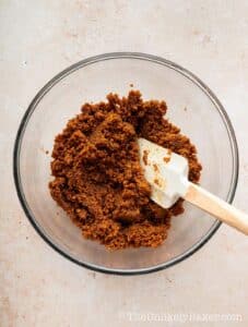 Pie crust mixture in a mixing bowl.
