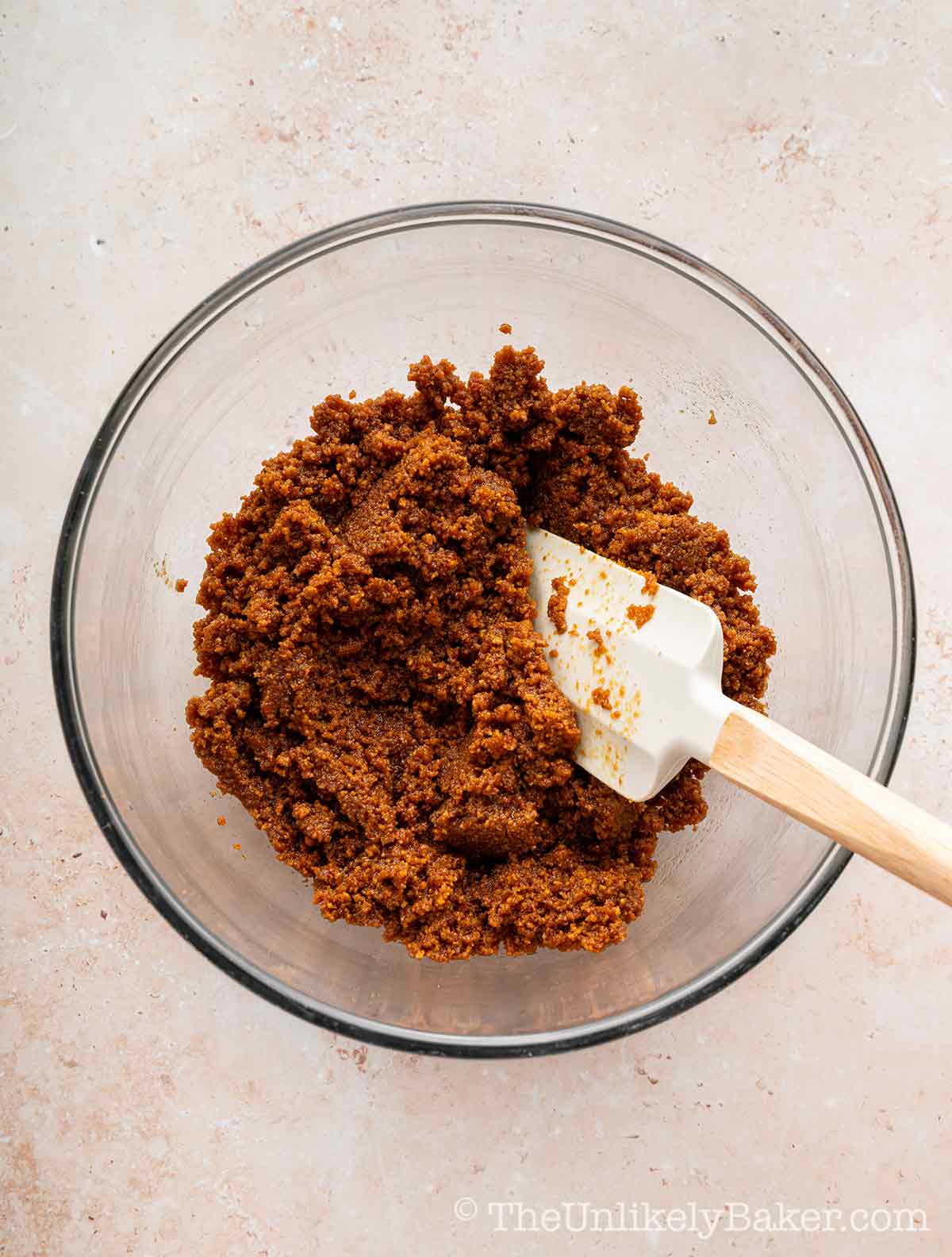 Pie crust mixture in a mixing bowl.