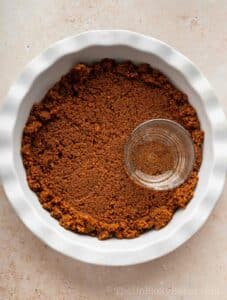 Crust mixture transfered to pie dish.