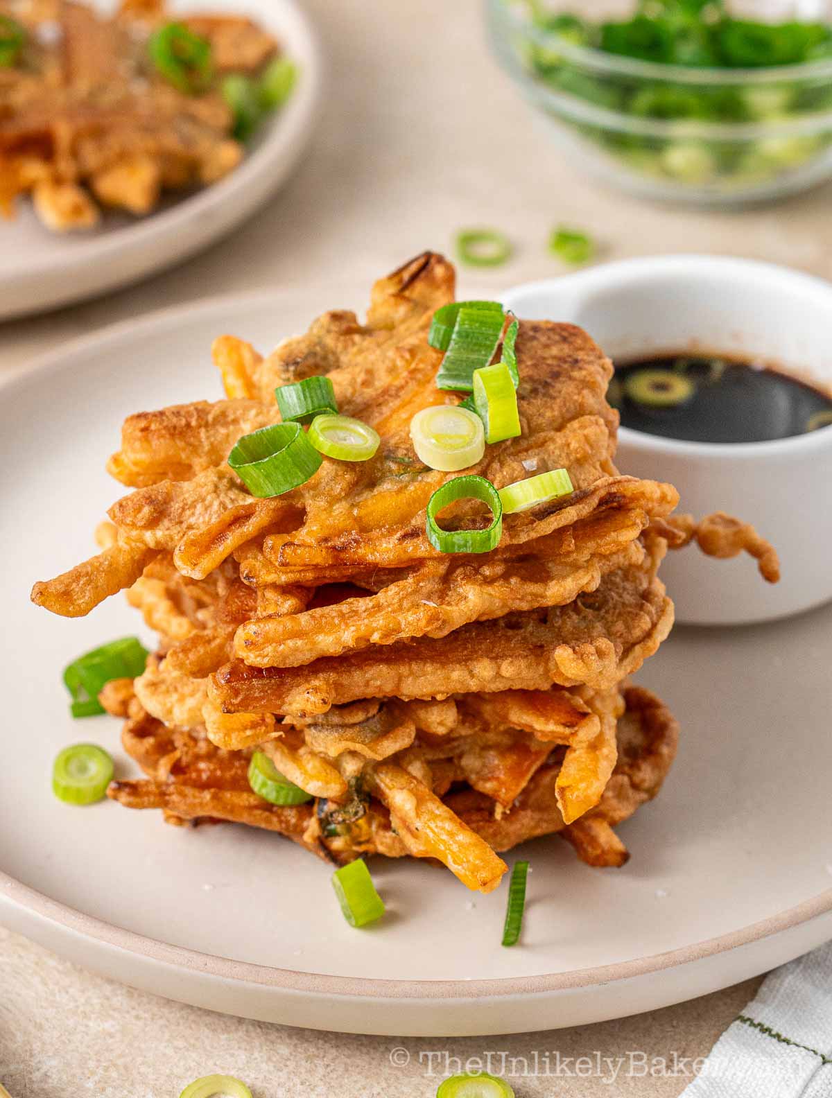 A stack of squash okoy on a plate.