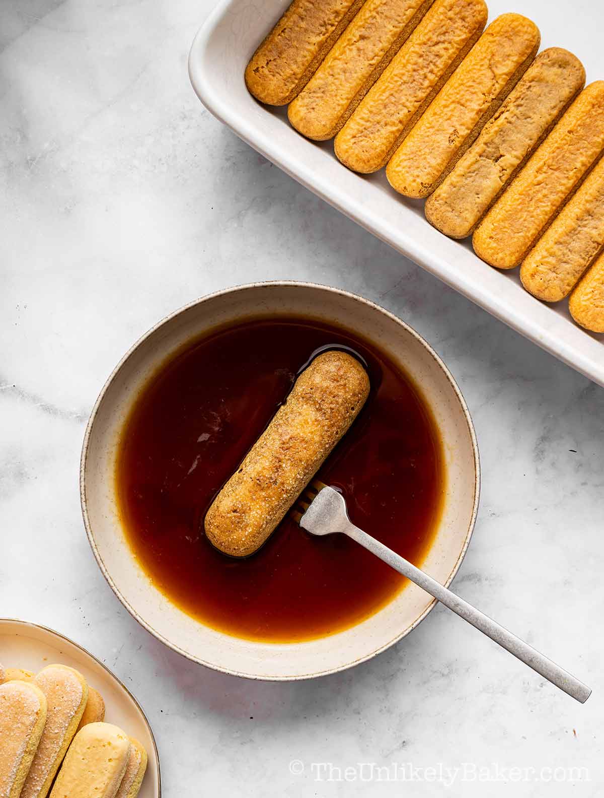 Savoiardi dipped in coffee.