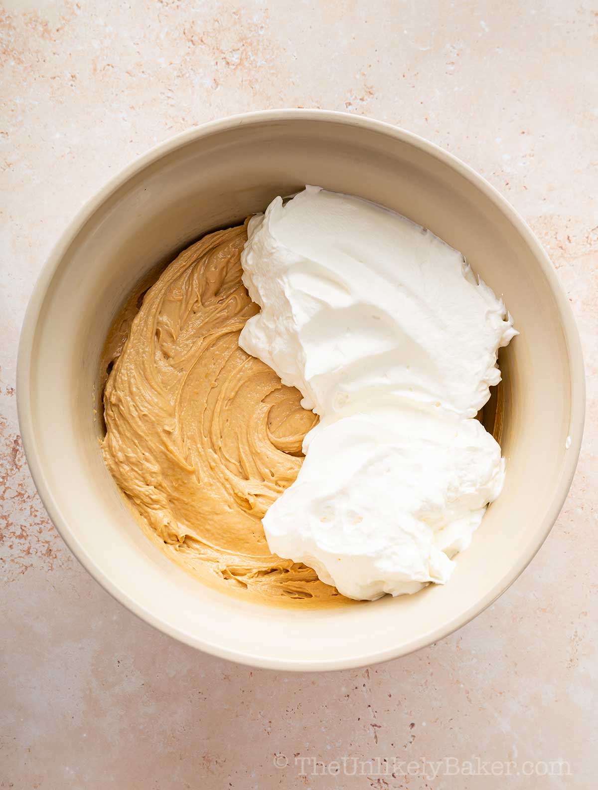 Whipped cream added to pie filling.