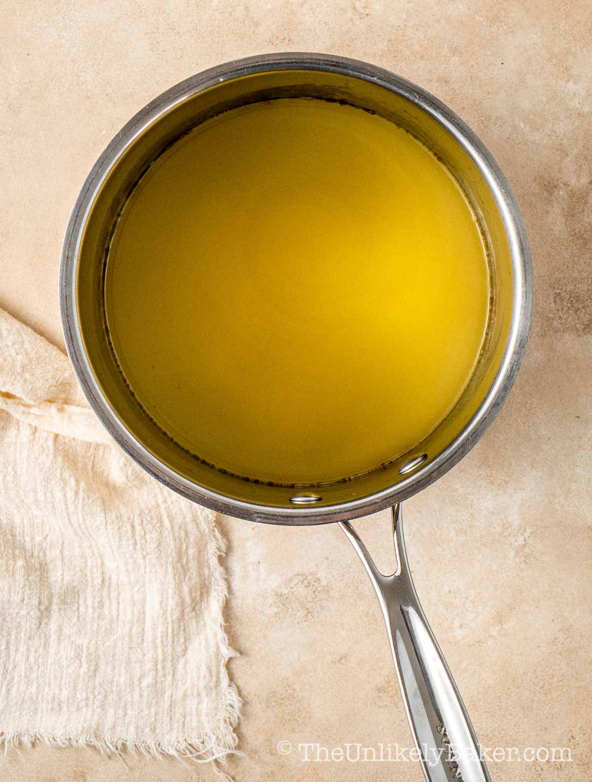 Melted butter in a pot.