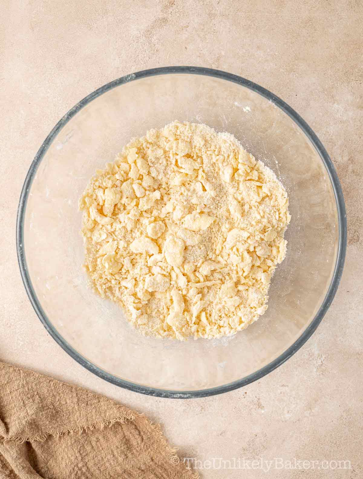 Butter cut into dry ingredients.