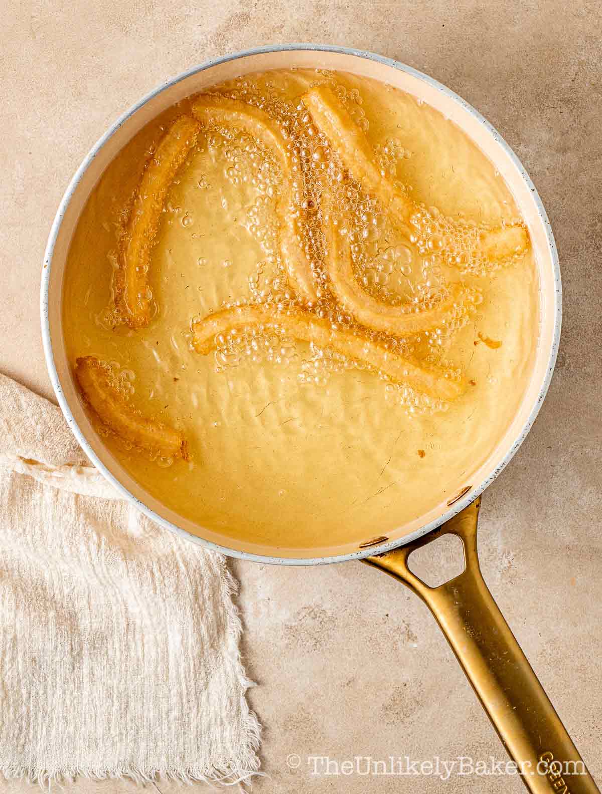 Churros in hot oil.