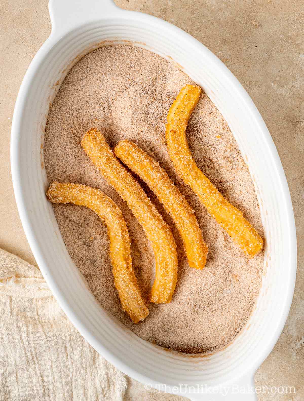 Churros coated in cinnamon sugar.