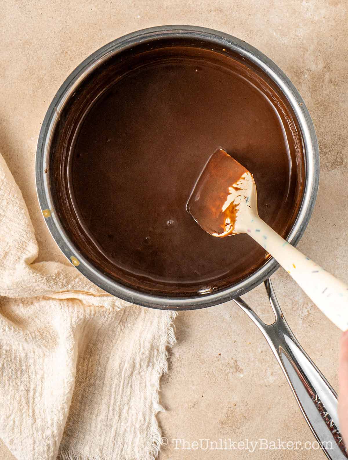Rich chocolate sauce in a pot.