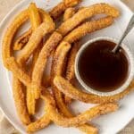 Crispy churros with chocolate dipping sauce.